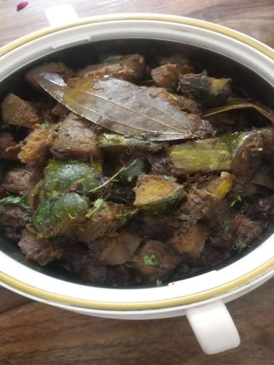 Tasty Kaddu ki Sabzi (Sitafal) cooked by COOX chefs cooks during occasions parties events at home