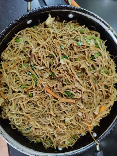 Tasty Chicken Hakka Noodles cooked by COOX chefs cooks during occasions parties events at home