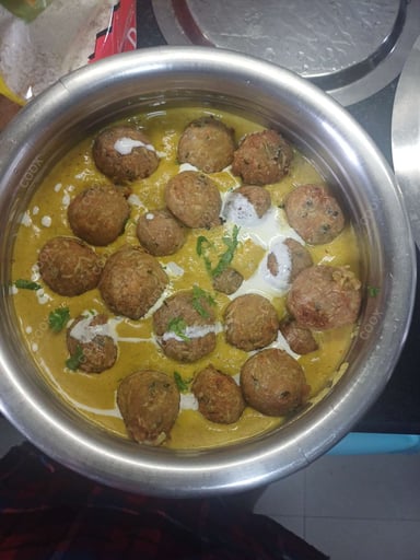 Tasty Lauki Kofta cooked by COOX chefs cooks during occasions parties events at home