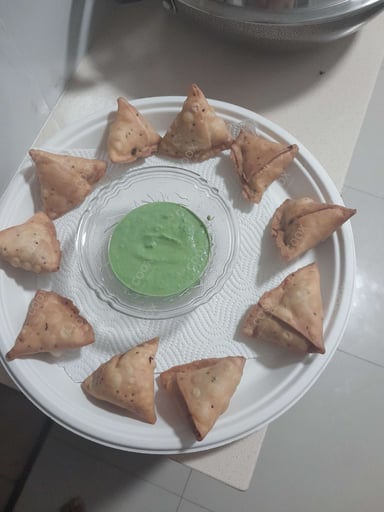 Tasty Keema Samosas cooked by COOX chefs cooks during occasions parties events at home
