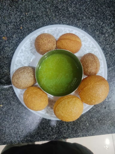 Tasty Gol Gappe (Pani Puri) cooked by COOX chefs cooks during occasions parties events at home