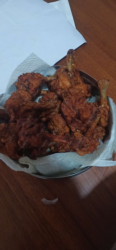 Tasty Chicken Lollipop cooked by COOX chefs cooks during occasions parties events at home