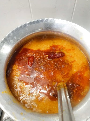 Tasty Masoor Dal  cooked by COOX chefs cooks during occasions parties events at home