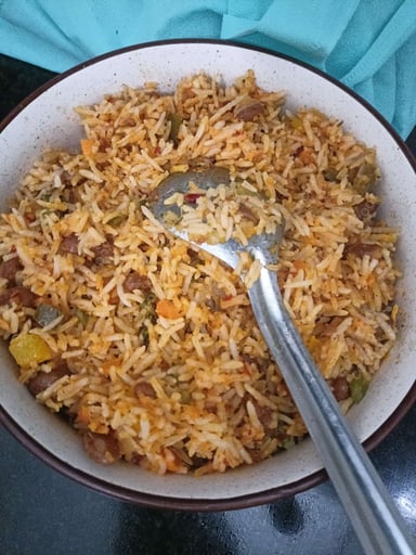 Tasty Mexican Rice cooked by COOX chefs cooks during occasions parties events at home