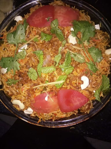 Tasty Chicken Biryani cooked by COOX chefs cooks during occasions parties events at home