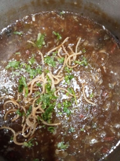 Tasty Chicken Manchow Soup cooked by COOX chefs cooks during occasions parties events at home