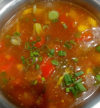 Tasty Mix Veg in Schezwan Sauce cooked by COOX chefs cooks during occasions parties events at home