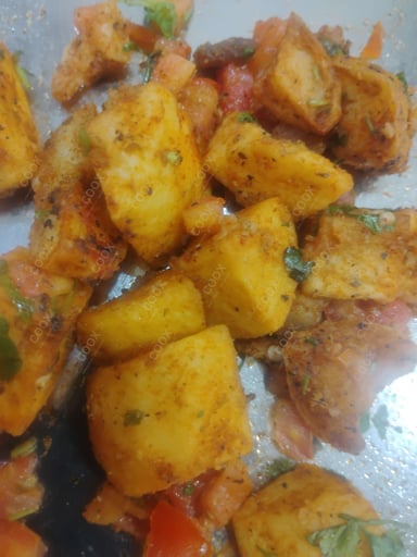 Tasty Aloo Chaat cooked by COOX chefs cooks during occasions parties events at home