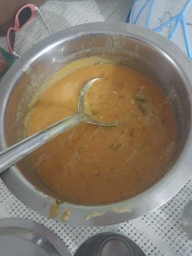 Tasty Masoor Dal  cooked by COOX chefs cooks during occasions parties events at home