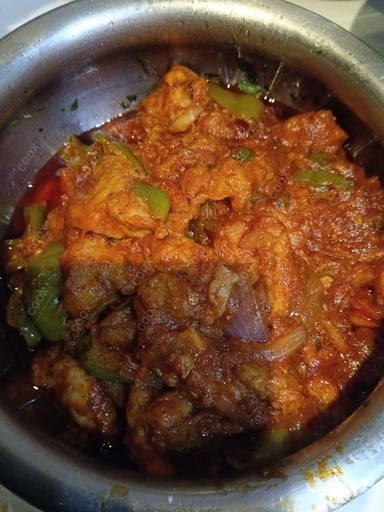 Tasty Chicken In Burnt Garlic Sauce cooked by COOX chefs cooks during occasions parties events at home