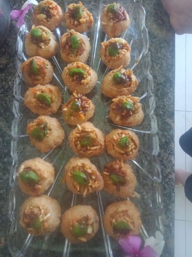 Tasty Bhel Puri cooked by COOX chefs cooks during occasions parties events at home