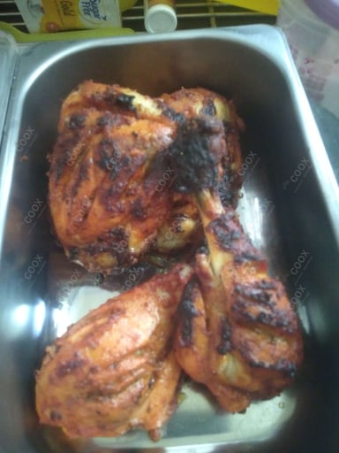 Tasty Tandoori Chicken cooked by COOX chefs cooks during occasions parties events at home