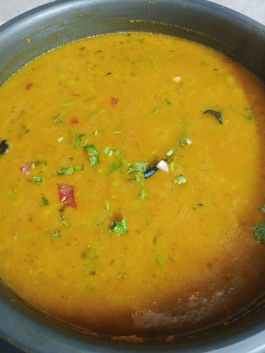 Tasty Masoor Dal  cooked by COOX chefs cooks during occasions parties events at home
