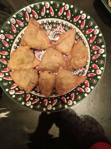 Tasty Keema Samosas cooked by COOX chefs cooks during occasions parties events at home