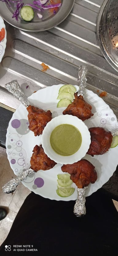 Tasty Chicken Lollipop cooked by COOX chefs cooks during occasions parties events at home