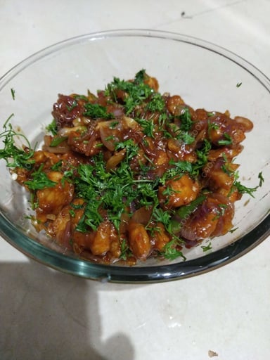 Tasty Red Chilli Prawns cooked by COOX chefs cooks during occasions parties events at home
