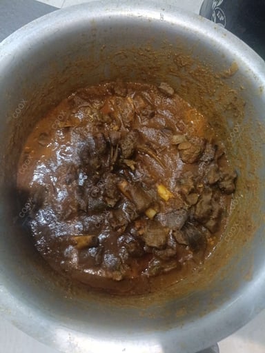 Tasty Mutton Sukha cooked by COOX chefs cooks during occasions parties events at home