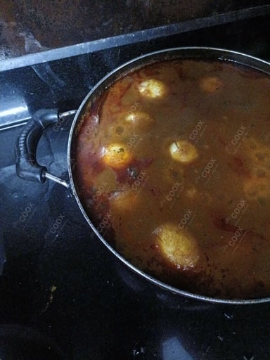 Tasty Egg Curry cooked by COOX chefs cooks during occasions parties events at home