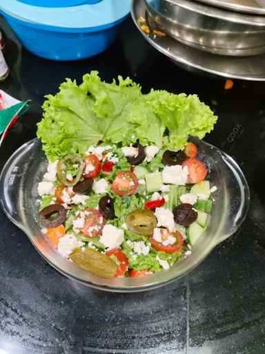 Tasty Greek Salad cooked by COOX chefs cooks during occasions parties events at home