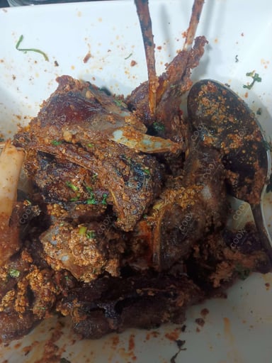 Tasty Mutton Sukha cooked by COOX chefs cooks during occasions parties events at home