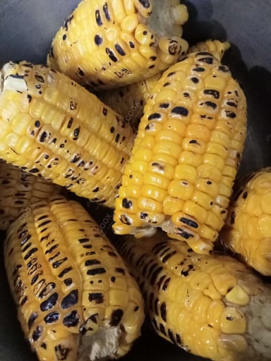 Tasty Grilled Corn cooked by COOX chefs cooks during occasions parties events at home