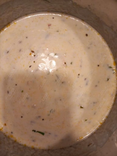Tasty Onion Raita cooked by COOX chefs cooks during occasions parties events at home