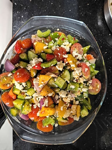Tasty Greek Salad cooked by COOX chefs cooks during occasions parties events at home