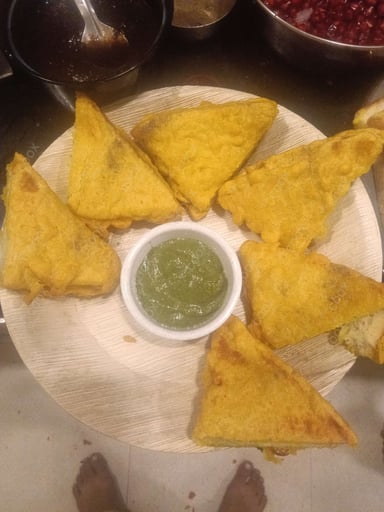 Tasty Bread Pakode cooked by COOX chefs cooks during occasions parties events at home