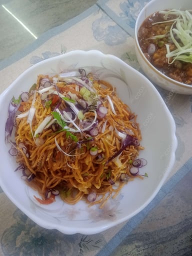 Tasty Chilli Garlic Noodles cooked by COOX chefs cooks during occasions parties events at home