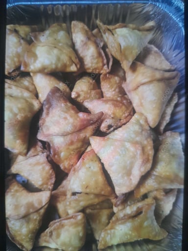 Tasty Keema Samosas cooked by COOX chefs cooks during occasions parties events at home