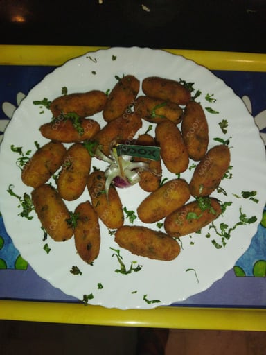 Tasty Veg Cutlets cooked by COOX chefs cooks during occasions parties events at home