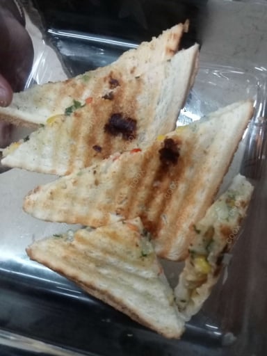Tasty Grilled Veg Sandwiches cooked by COOX chefs cooks during occasions parties events at home