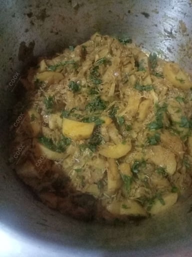 Tasty Aloo Patta Gobhi cooked by COOX chefs cooks during occasions parties events at home