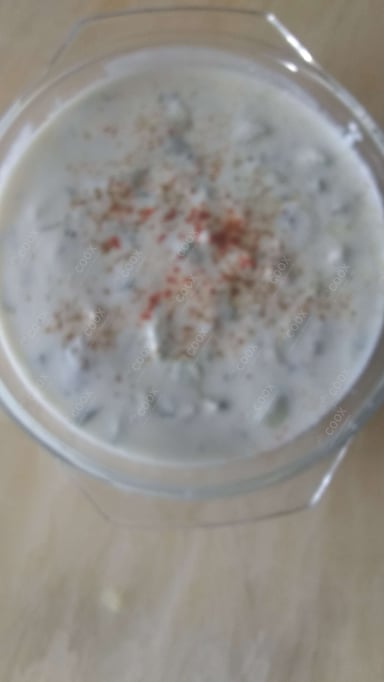 Tasty Cucumber Raita cooked by COOX chefs cooks during occasions parties events at home