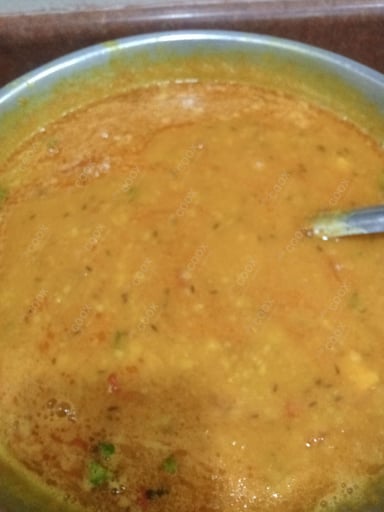 Tasty Masoor Dal  cooked by COOX chefs cooks during occasions parties events at home