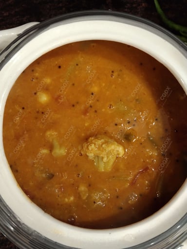 Tasty Sambhar cooked by COOX chefs cooks during occasions parties events at home