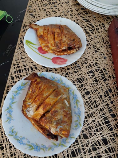 Tasty Grilled Fish cooked by COOX chefs cooks during occasions parties events at home