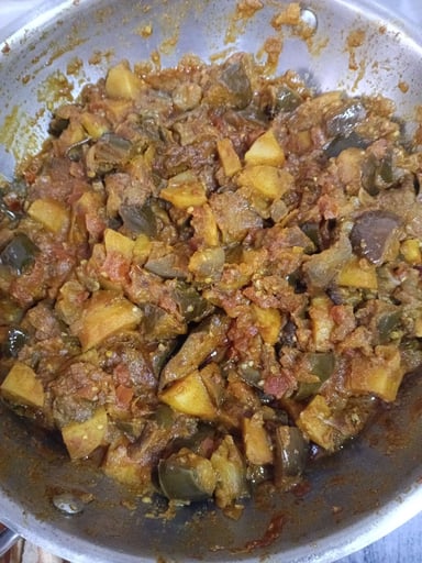 Tasty Baingan ki Sabzi cooked by COOX chefs cooks during occasions parties events at home