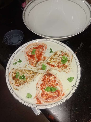 Tasty Mix Veg Raita cooked by COOX chefs cooks during occasions parties events at home