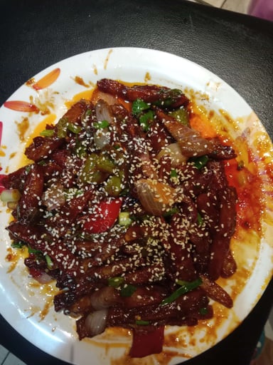 Tasty Chicken Hakka Noodles cooked by COOX chefs cooks during occasions parties events at home