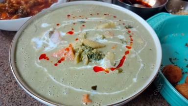 Tasty Green Thai Curry cooked by COOX chefs cooks during occasions parties events at home