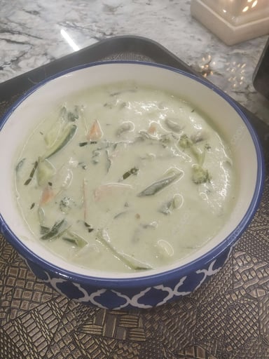 Tasty Green Thai Curry cooked by COOX chefs cooks during occasions parties events at home