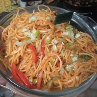 Tasty Chilli Garlic Noodles cooked by COOX chefs cooks during occasions parties events at home