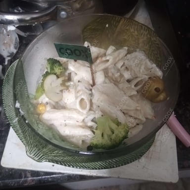 Tasty Pasta in White Sauce cooked by COOX chefs cooks during occasions parties events at home