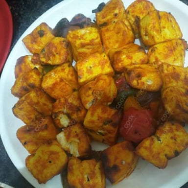 Tasty Paneer Tikka cooked by COOX chefs cooks during occasions parties events at home