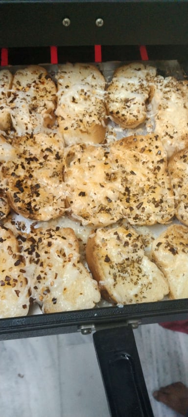 Tasty Garlic Bread with Cheese cooked by COOX chefs cooks during occasions parties events at home