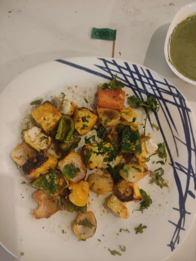 Tasty Paneer Tikka cooked by COOX chefs cooks during occasions parties events at home
