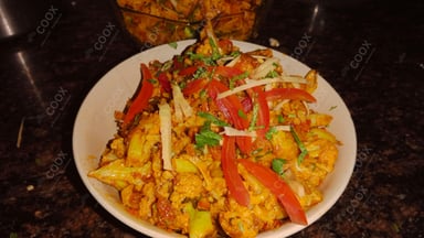 Tasty Adraki Gobhi cooked by COOX chefs cooks during occasions parties events at home