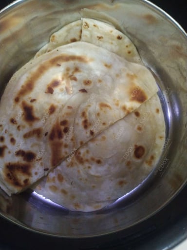 Tasty Naan (Butter / Garlic) cooked by COOX chefs cooks during occasions parties events at home