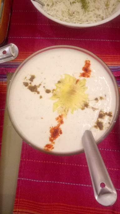 Tasty Pineapple Raita cooked by COOX chefs cooks during occasions parties events at home